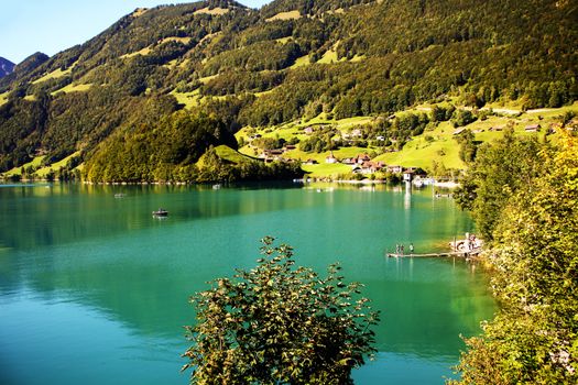 lake lungern Switzerland - famous fishing lake in Switzerland.Reflection in water