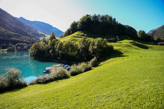 lake lungern Switzerland - famous fishing lake in Switzerland. Reflection in water