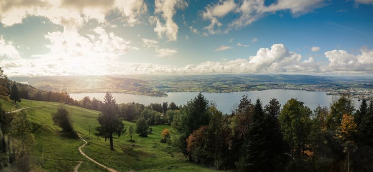 view of Luzern and lake Luzern from mount Rigi with Sun reflection