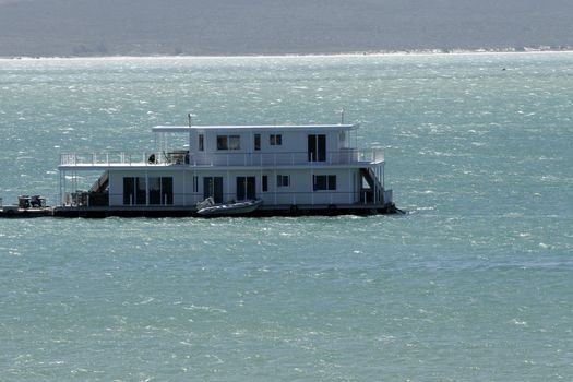 house boat on river on South Africa with reflection in water