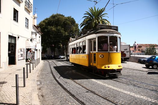 yellow tram in old town of Portugal. Yellow tram