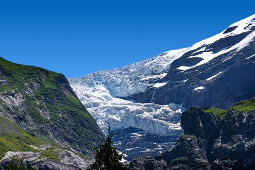 mountains around grindelwald in Switzerland, with mountain and snow