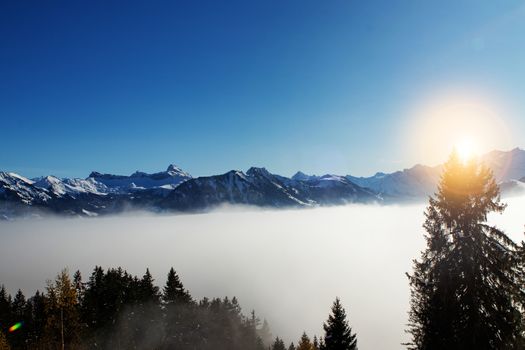 above the fog in Lungern with the swiss Alps