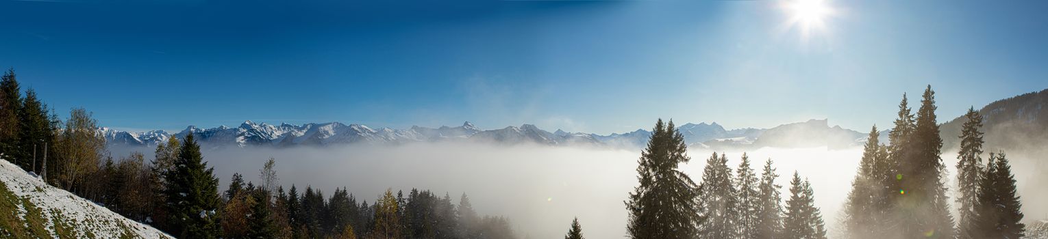 above the fog in Lungern with the swiss Alps, shot above the clouds
