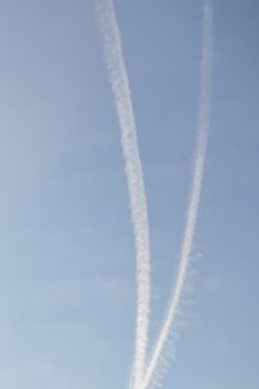 jet fuel trail left by planes at the sky