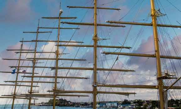 Wood masts of an old clipper ship against a nice sky