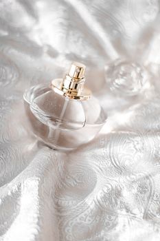Perfume bottle with aromatic floral scent, luxury fragrance for women