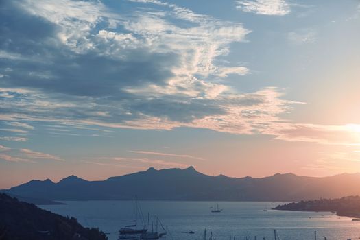 Beautiful sea view and mountains in the Mediterranean at sunset, summer vacation travel and holiday destination