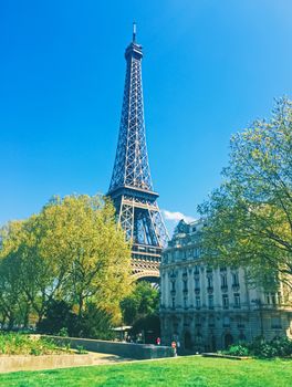 Eiffel Tower and blue sky, famous landmark in Paris, France in spring