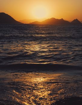 Beautiful sea view and mountains in the Mediterranean at sunset, summer vacation travel and holiday destination