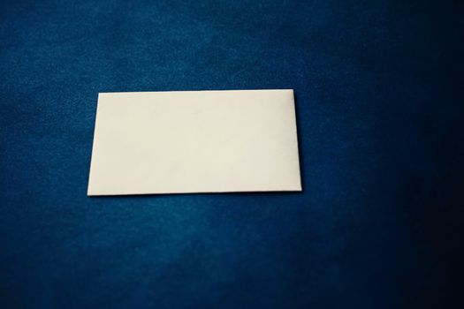 Blank beige paper card on blue background, premium business and luxury brand identity mockup