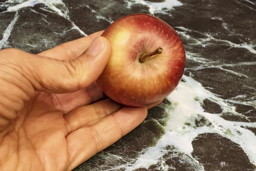 close up ready to eat apple fruit on background