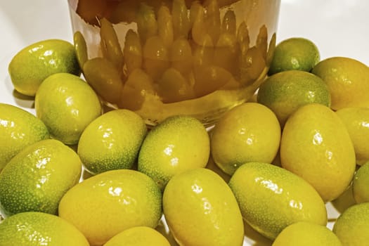 close up kumquat fruits on background