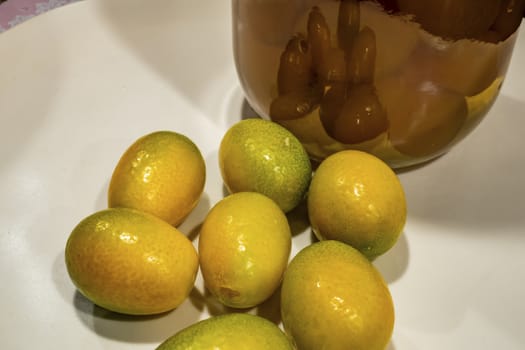 close up kumquat fruits on background