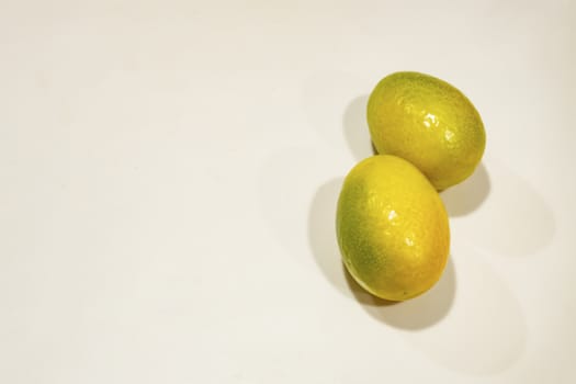 close up kumquat fruits on background