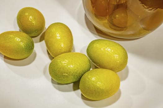 close up kumquat fruits on background