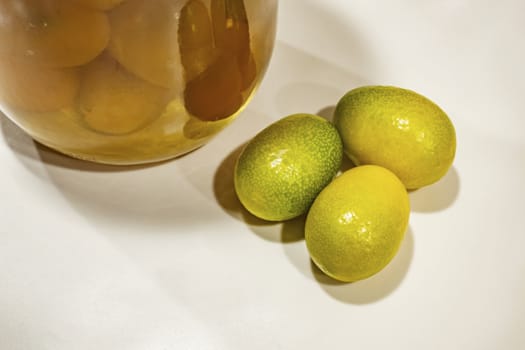 close up kumquat fruits on background
