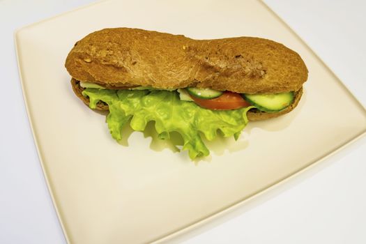 ready to eat sandwich with lettuce,cheese, sliced tomatoes and cucumber