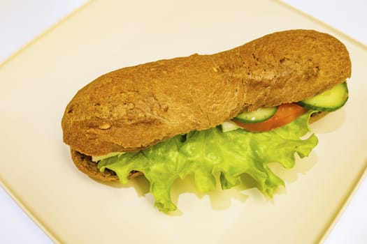 ready to eat sandwich with lettuce,cheese, sliced tomatoes and cucumber