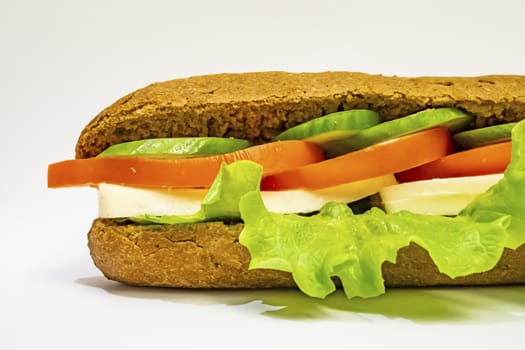 ready to eat sandwich with lettuce,cheese, sliced tomatoes and cucumber