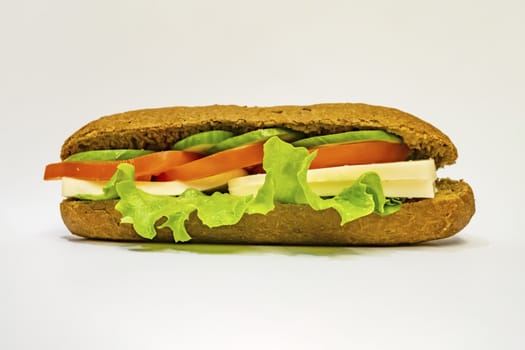 ready to eat sandwich with lettuce,cheese, sliced tomatoes and cucumber