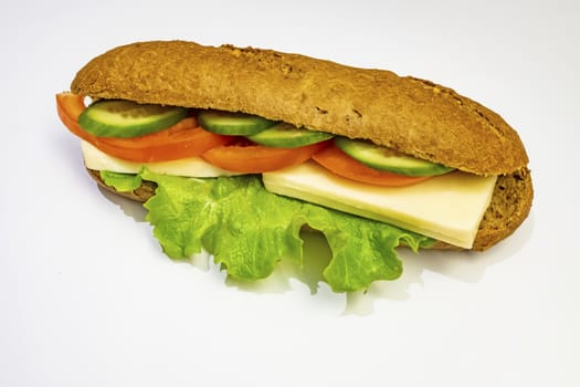 ready to eat sandwich with lettuce,cheese, sliced tomatoes and cucumber