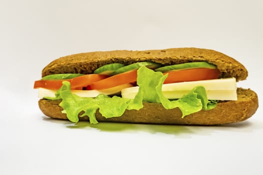 ready to eat sandwich with lettuce,cheese, sliced tomatoes and cucumber