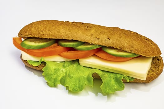 ready to eat sandwich with lettuce,cheese, sliced tomatoes and cucumber
