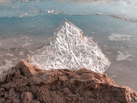 Close up of Ice on the beach. Beach on Eastern seaside of Europe in Estonia with ice chunks. Copy space for text box. Image for wallpaper and desktop