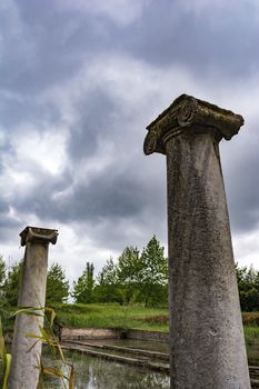 Ancient column ruins in the Dion Archaeological Site at Greece.