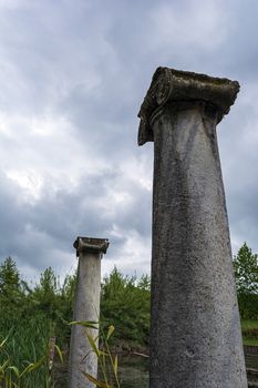 Ancient column ruins in the Dion Archaeological Site at Greece.