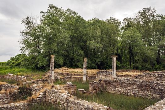 Ancient column ruins in the Dion Archaeological Site at Greece