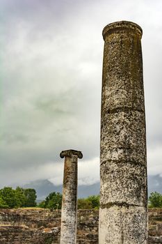 Ancient column ruins in the Dion Archaeological Site at Greece.