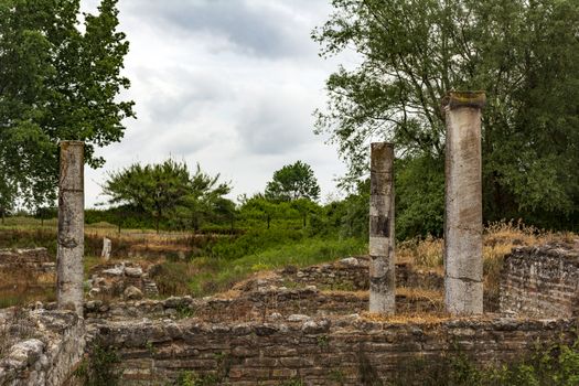 Ancient column ruins in the Dion Archaeological Site at Greece.