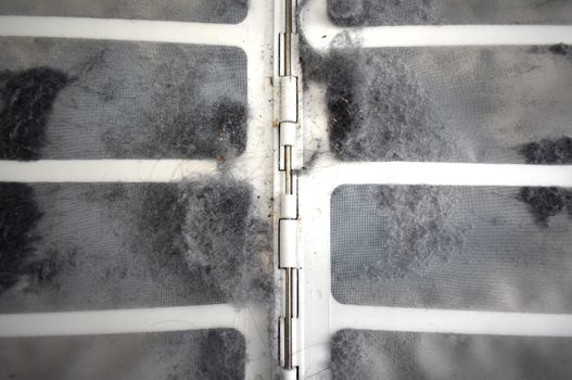 A small amount of lint in a dryer filter