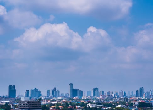 Bangkok City downtown cityscape urban skyline and the cloud in blue sky. Wide and High view image of Bangkok city