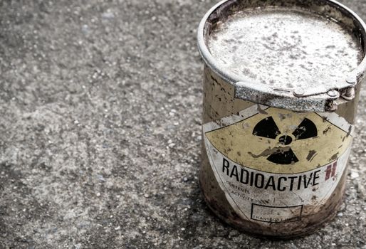 Old and rusted cylinder shape container of Radioactive material