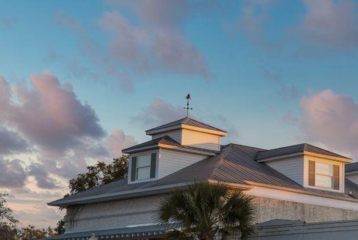 Roof of old building in golden light of sunset