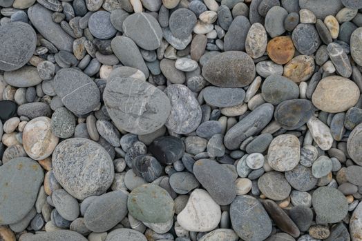 The background pattern of gravel stones at stone beach in Hualien, Taiwan.