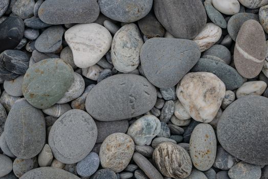 The background pattern of gravel stones at stone beach in Hualien, Taiwan.