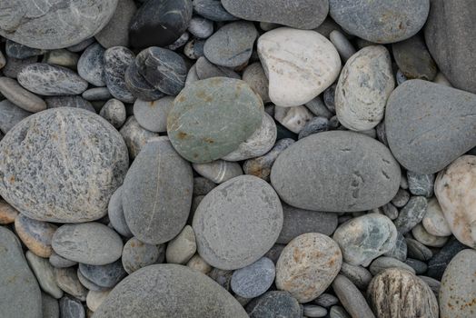 The background pattern of gravel stones at stone beach in Hualien, Taiwan.