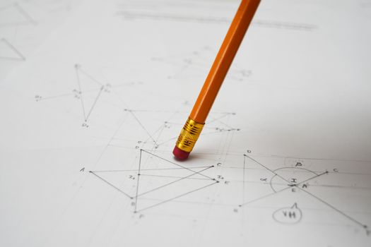 Technical drawing with pencil rubber eraser, papers
