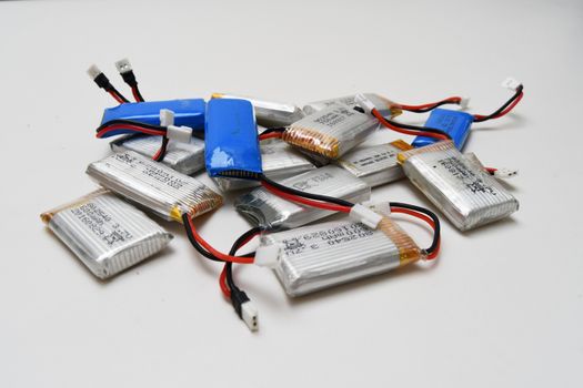 Bunch of small blue and grey drone li-po batteries