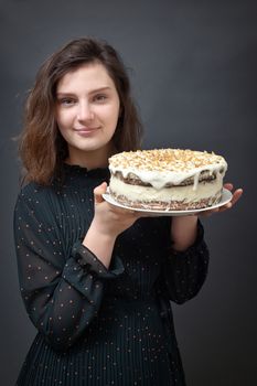 Young Girl Holding Birthday Cake in Studio