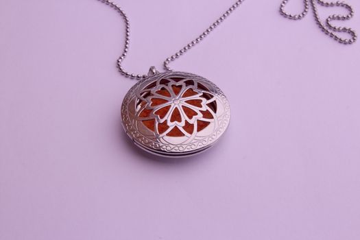 Essential oil infuser used as pendant of a necklace