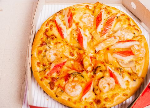 Hot Homemade, Vegetarian fast Italian food, Delivery Pizza pepperoni, cheese many slices in an open cardboard box