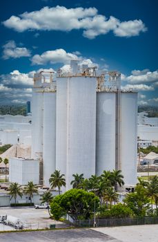 Tall storage tanks in an industrial park
