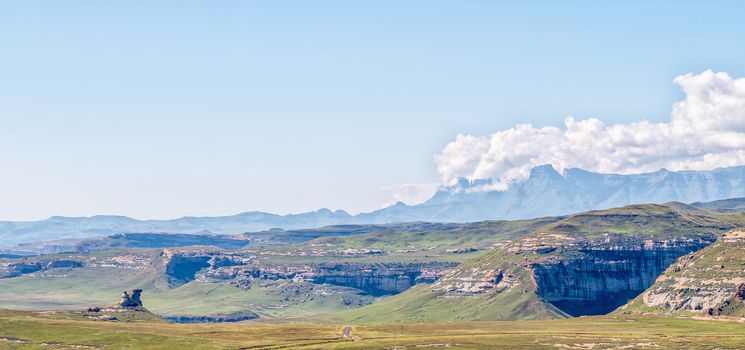 The Amphitheatre in the Drakensberg as seen from the Wodehouse Trail in Golden Gate. The horse and rider is visible to the left