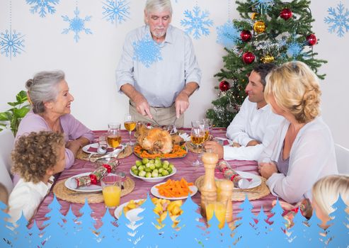 Composite image of grandfather carving the turkey against snowflakes and fir trees in blue