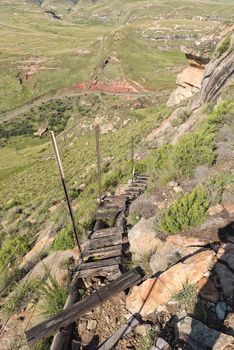 Wooden steps on the Wodehouse Trail at Glen Reenen in Golden Gate. Rooidraai is visible in the back